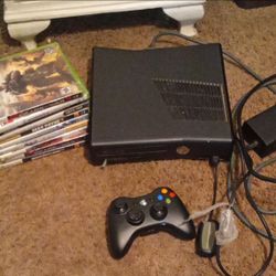 Xbox 360 with cords games and controller
