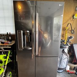 LG Refrigerator - 26 cu ft. Side By Side