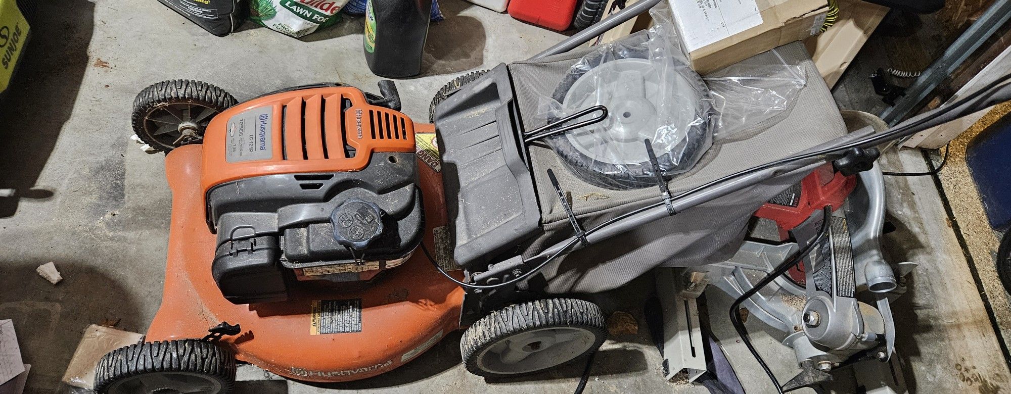 Orange Husqvarna Push Mower LC121P
