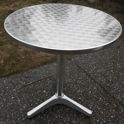 Stainless Top Cafe Table Metal Industrial Brushed Patterened Surface.