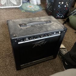 peavey rage 158 amp and fender guitar