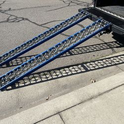 2 Werner “1848” Sections Blue Gravity Roller Conveyor With Hooks On Ends 8ft by 1ft  Durable blue gravity roller conveyor. Two sections with metal rol