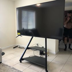 70 Inch Tv, Sound Bar And Eiffel Tower Stand