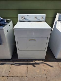 Whirlpool gas dryer has a little rust on it but works well.
