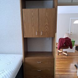 3 Drawer storage unit with a cabinet above
