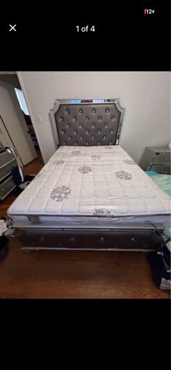 mirrored tufted headboard and bedframe
