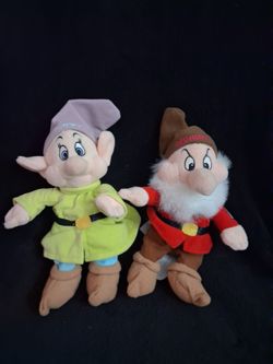 Dopey and Grumpy plush toys