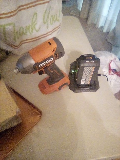 Ridgid Impact Battery And Battery Charger