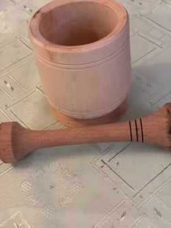 New wooden mortar with pestle