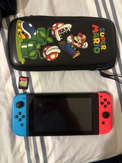 Switch 1 with case, 1 game, and accessories