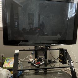 58” TV and Glass TV Stand 