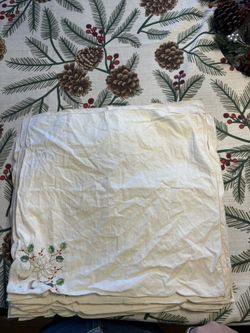 vintage Christmas embroidered napkins And Table Clothwith a holly and poinsettia design