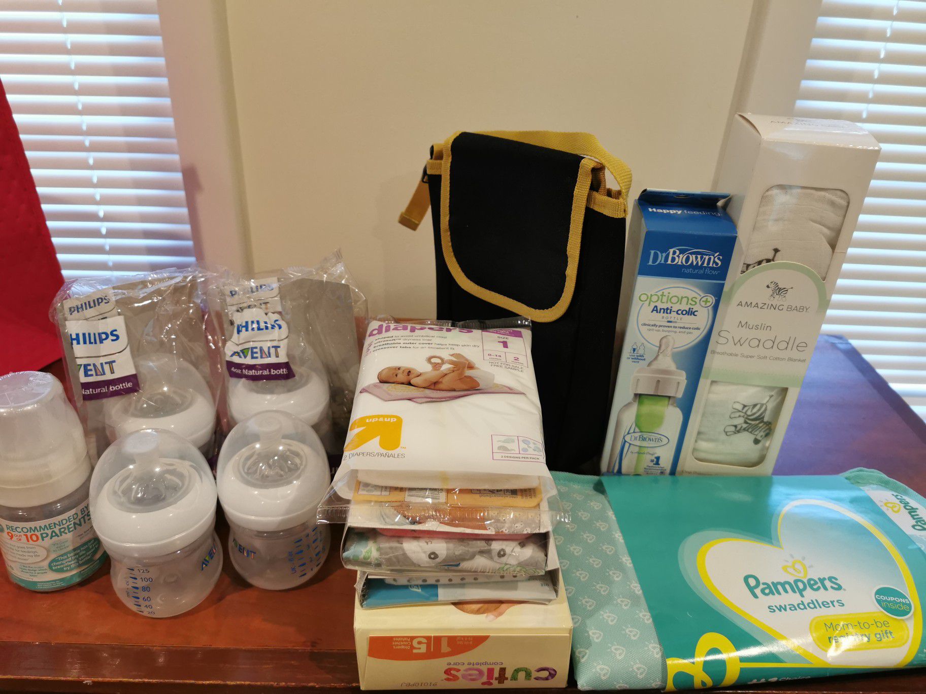 Baby gift (bottles, diapers, swaddle and More)