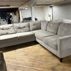 Delivery available gray sectional couch