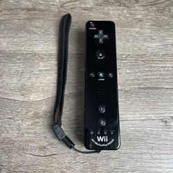 Black Nintendo Wii Remote With Motion Plus 