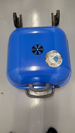 Americana charcoal grill,brand  new,blue