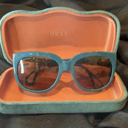Chic Teal Gucci Sunglasses – Statement-Making with Subtle Glam