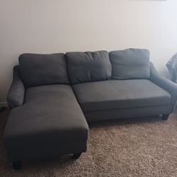 Nice gray sectional with pull out extender piece