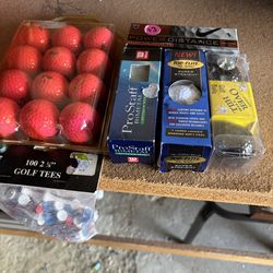 New golf balls and tee,s