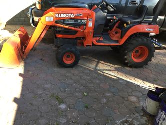 Kubota 4 wheel drive tractor front end loader also 3 point hitch & pro