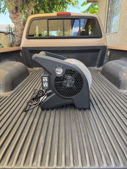 Lasko Pivoting 11.2 in. 3 Speed High Velocity Blower Fan for Home, Job Site in Gray, 2 120V Outlets, Circuit Breaker