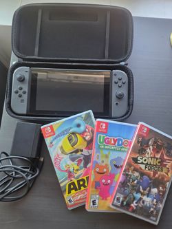 Nintendo Switch with Games and case
