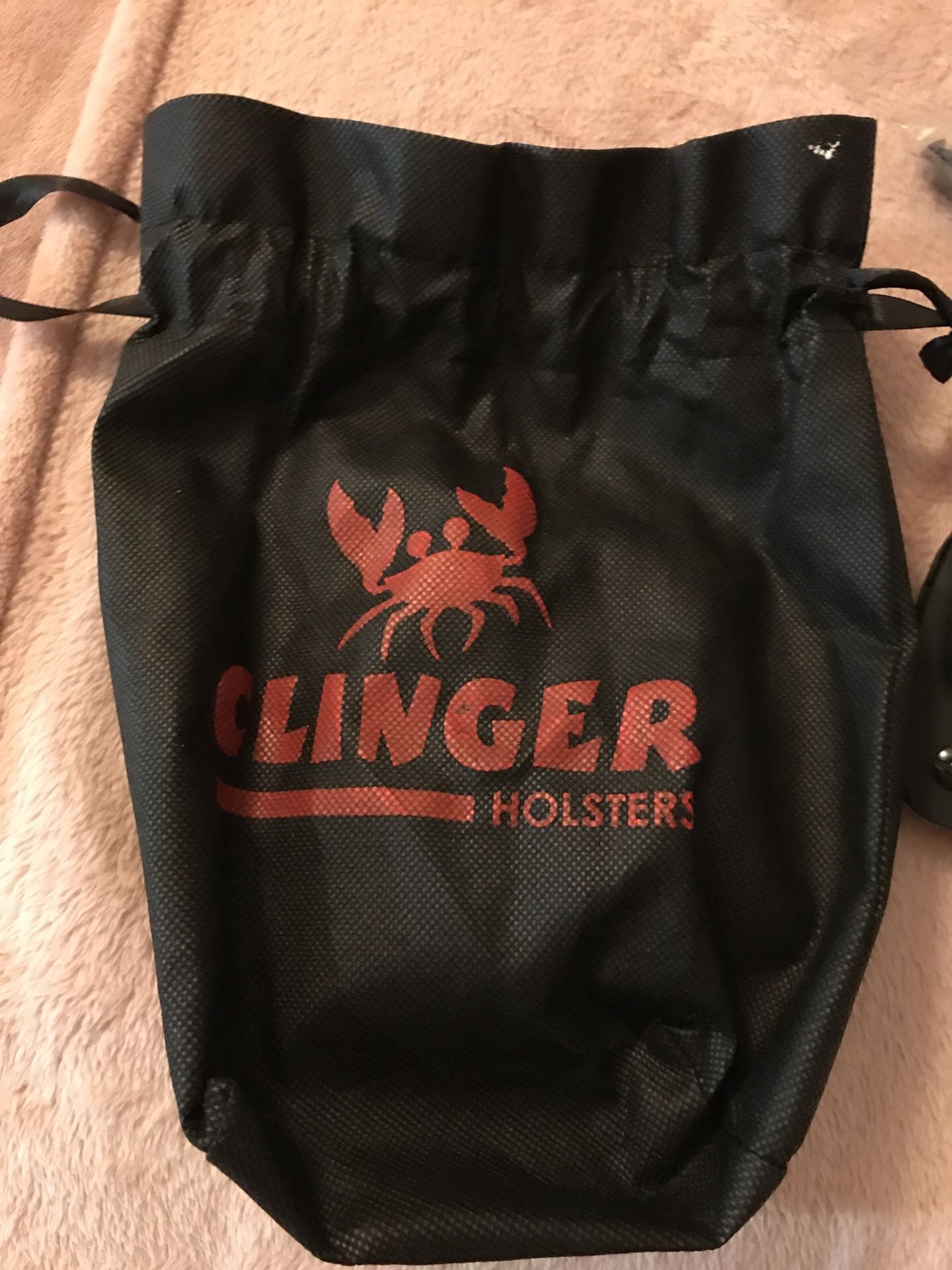 Brand new clinger 9mm holster, never used