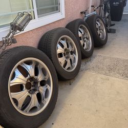 4 Tires With Nice Shiny Rims On Sale. 275/55   R20.  Still good condition