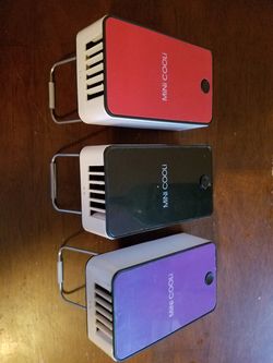 Mini handheld A.C (not a fan) brand new in box