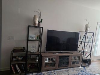 Wood TV stand with fireplaces,  2 high wood shelves 1 record player stand 1 center table 2 side tables  1 console table