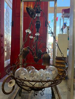 Chandelier bronze metal with glass globe inside
