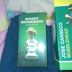 Rickey Henderson Bobble Head And Jose Canseco Bobble Head 