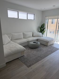 L shape white couch