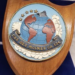 NH 102709-KN Insignia of United States Navy Ship USS Des Moines Plaque on Wood