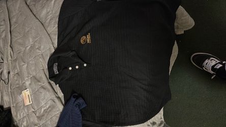 Sizes are L an XL Versace jeans couture blue an black polo  $40for both