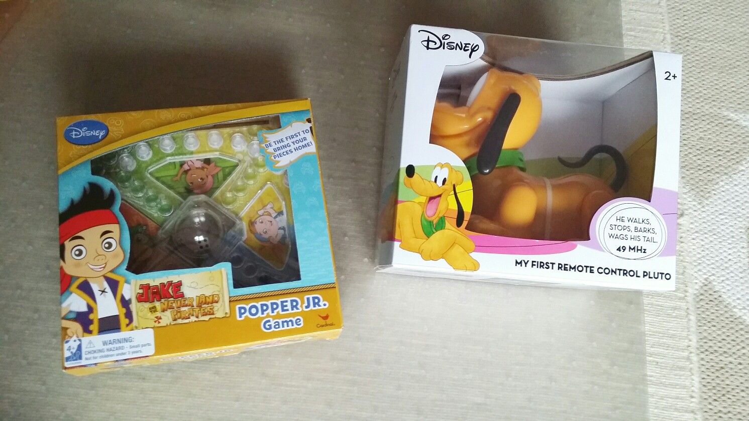 Set of 2 brand new toys. Both for $10. Remote control Pluto and board game