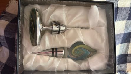 Wine glass stopper and corkscrew