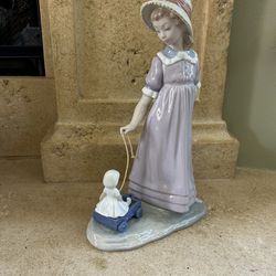 Lladro Woman Pulling Wagon with Baby