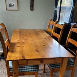 Dining table with 4 chairs.