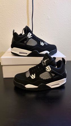 Air Jordan 4 Black and White Sneakers
