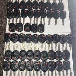 OEM Original Lot of 68 Ford Keyless Remotes Entry Fob OUCD(contact info removed)  (2006-2012)