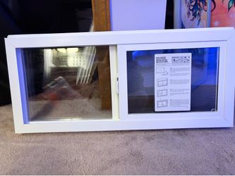 Vinyl basement slider window