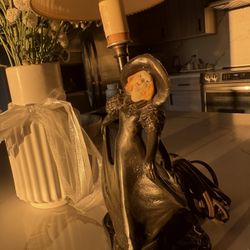 vintage Art Deco-style figural lamp