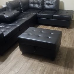 Black Leather Sectional And Ottoman 