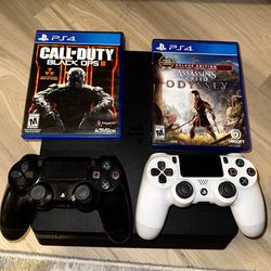 PS4 Slim + 2 Controllers + 2 Games 
