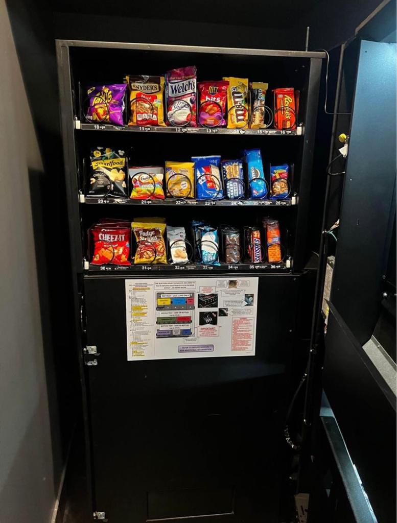 Vending machine compatible with credit card reader.