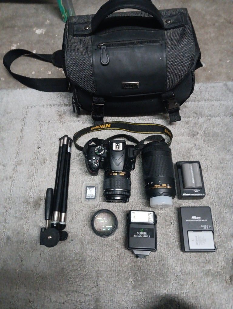 Nikon Camera With Tripod, Fish Eye Lens, Flash,and 2 Batteries