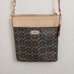 Coach Brown Signature Coated Canvas And Tan Leather Trim Crossbody Bag. 