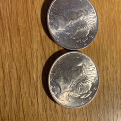 1922 And 1923  Uncirculated Peace Dollars