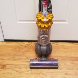 NEW condition  Dyson VACUUM WITH AMAZING POWER SUCTION. , WORKS EXCELLENT    